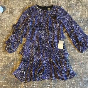 It’s a purple ruffled dress super light.